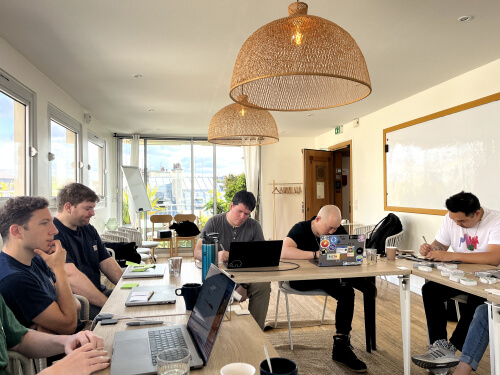 A photograph of the 0x team